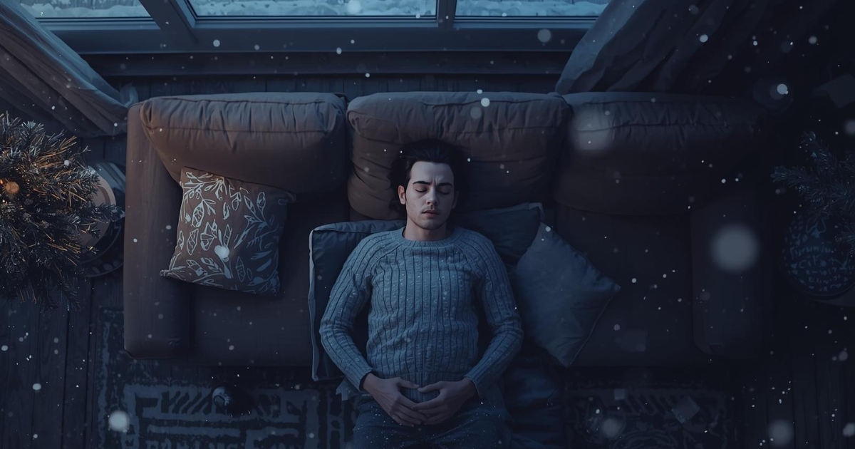 person resting on couch after holidays experiencing post-holiday burnout, quiet winter morning representing emotional reset after the holidays